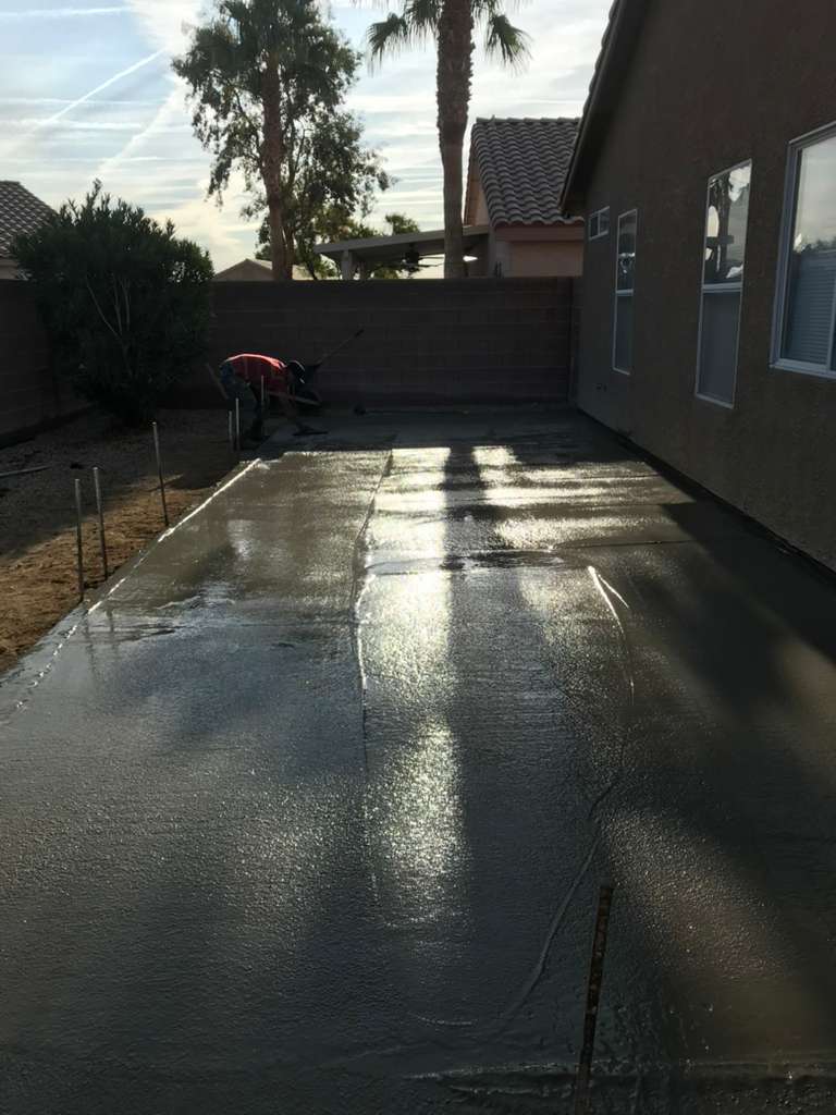Side-yard slab, float finish in progress