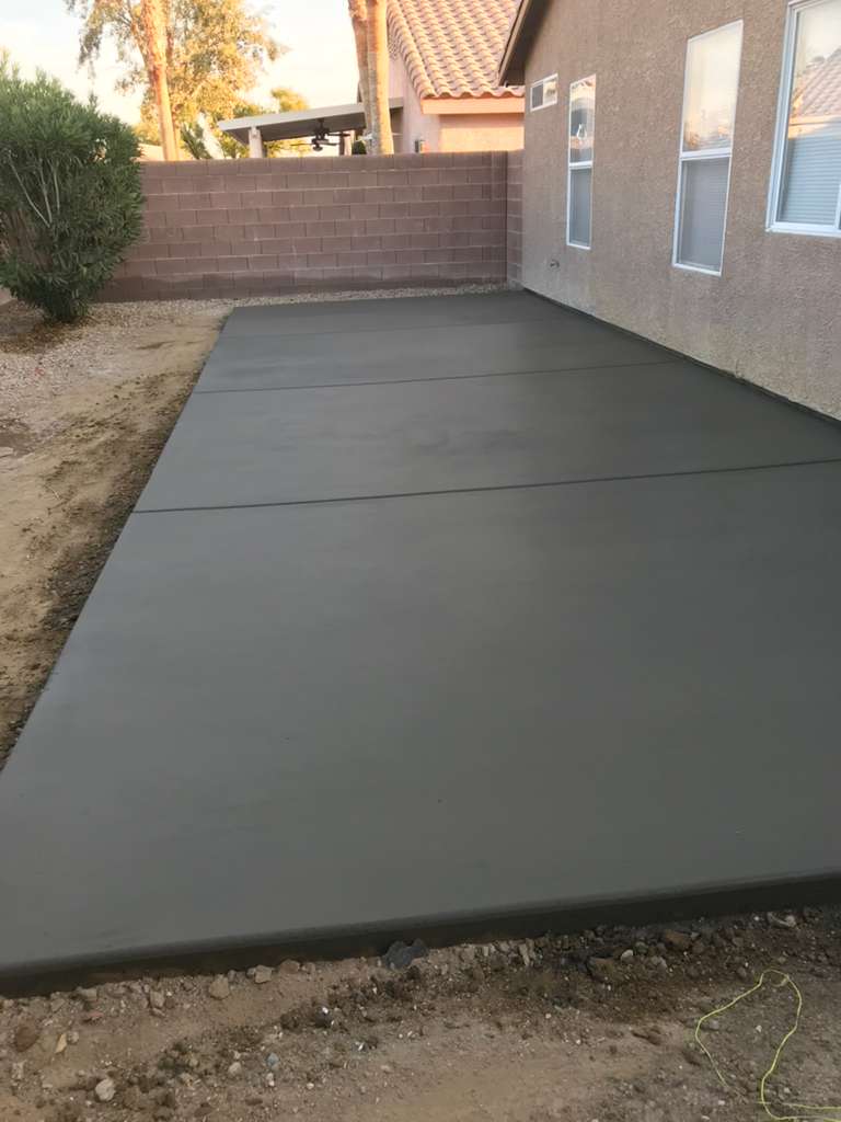Fresh residential pour, working the surface