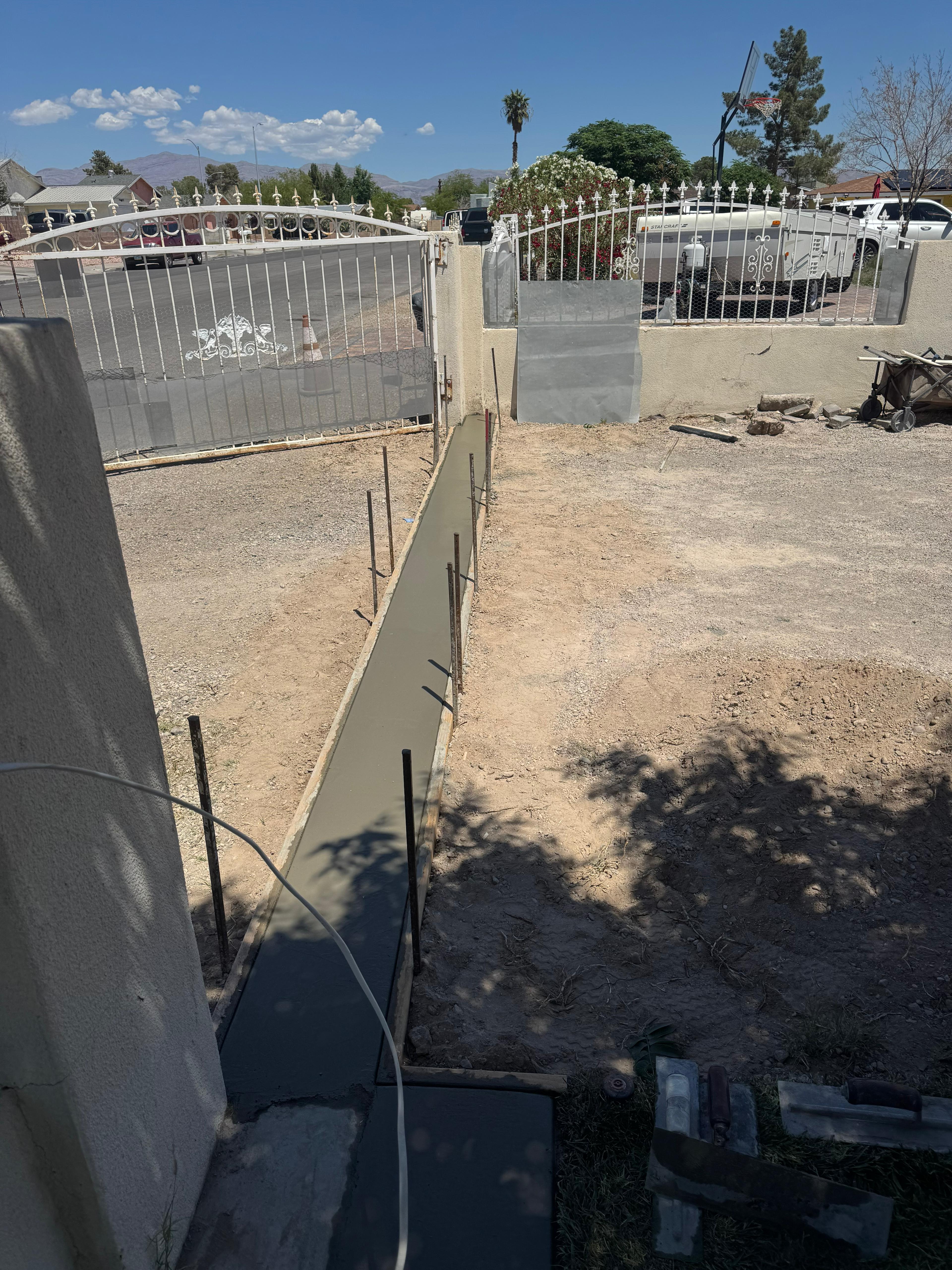 Formed walkway pour with stakes set