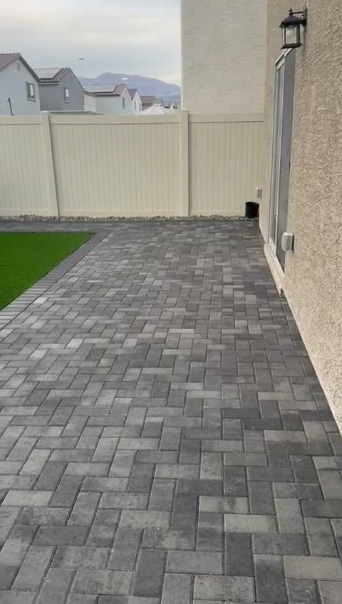 Finished paver patio with turf border