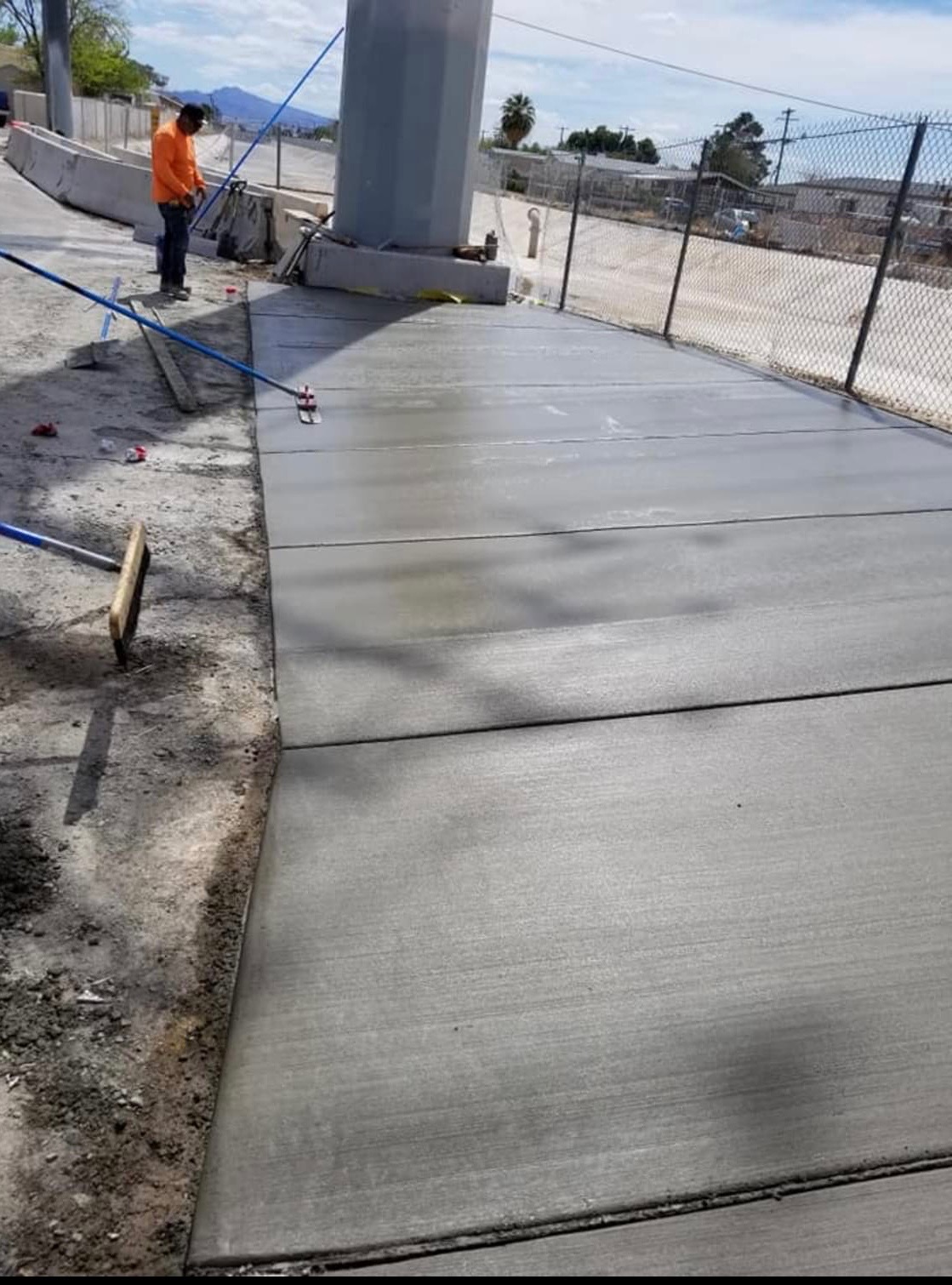 Completed walkway alongside flood channel